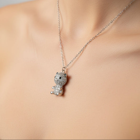 Silver panda pendant necklace on a white background